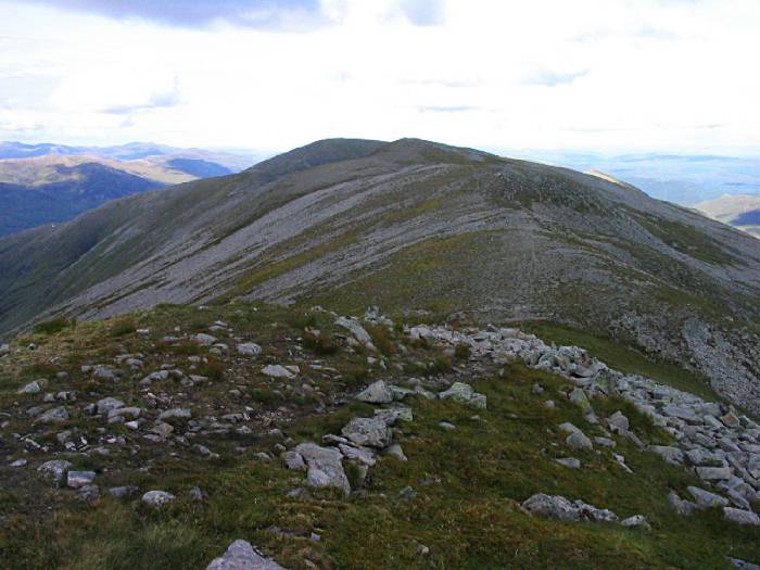 And finally a broad hump and then down at Garth Bealach with the tiny lochan - or on to the other two Munros?